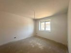 Erstbezug! Helle 3-Zimmer-Wohnung mit Balkon und Stellplatz - Schlafzimmer.jpg