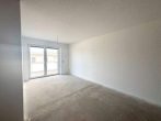 Erstbezug: Moderne 3-Zimmer-Wohnung mit Balkon in Barnstorf - Wohnzimmer.jpg