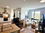 Moderne 2-Zimmer-Wohnung mit Balkon und heller Atmosphäre - Wohnzimmer