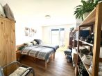 Moderne 2-Zimmer-Wohnung mit Balkon und heller Atmosphäre - Schlafzimmer
