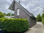 Modernes Einfamilienhaus in begehrter Lage – Neuwertig, exklusiv ausgestattet mit Sauna - Ansicht rückläufig.jpg
