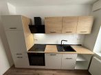 Gepflegte 3-Zimmer-Wohnung mit Stellplatz und Balkon - Beispielbild Küche
