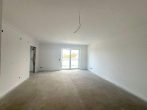 Attraktive 2-Zimmer-Wohnung im Zentrum von Barnstorf - Erstbezug! - Wohnzimmer.jpg