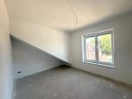 Attraktive 2-Zimmer-Wohnung im Zentrum von Barnstorf - Erstbezug! - Schlafzimmer.jpg