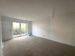 Moderne 3-Zimmer-Wohnung mit Terrasse und separatem Eingang - Wohnzimmer.jpg