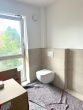 Erstbezug - Moderne 2-Zimmer-Wohnung mit Sonnenbalkon in Kreyenbrück - Badezimmer.jpeg