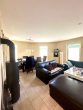 Attraktives Einfamilienhaus mit eigenem Garten und Garage - in ruhiger Wohnlage - Wohnzimmer.jpeg