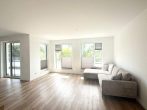 Moderne 2-Zimmer-Wohnung mit Dachterrasse und heller Atmosphäre - Wohnzimmer.jpg