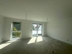 Attraktive 3-Zimmer-Wohnung mit Stellplatz und Balkon - Erstbezug! - Wohnzimmer.jpg