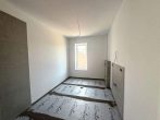 Moderne 2-Zimmer-Wohnung mit sonnigem Balkon im Erstbezug - Badezimmer.jpg