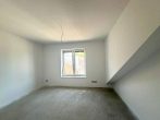 Moderne 2-Zimmer-Wohnung mit sonnigem Balkon im Erstbezug - Schlafzimmer.jpg