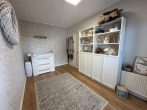 Charmanter Bungalow mit Wintergarten & ausbaufähigem Dachgeschoss | PV Anlage & Wallbox - Schlafzimmer 2.JPG