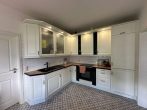 Charmanter Bungalow mit Wintergarten & ausbaufähigem Dachgeschoss | PV Anlage & Wallbox - Küche 2.JPG