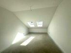Erstbezug! Attraktive 2-Zimmer-Wohnung im Zentrum von Barnstorf - Schlafzimmer.jpg