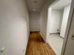 Moderne 2-Zimmer-Neubauwohnung mit Balkon und Stellplatz - Flur.jpg