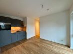 Moderne 2-Zimmer-Neubauwohnung mit Balkon und Stellplatz - Wohn- u. Essbereich..jpg