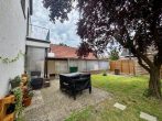 Vielseitiges Ein- oder Zweifamilienhaus in Bümmerstede mit Terrasse, Garage und attraktivem Grundstück - Terrasse.jpg