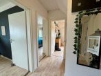 Vielseitiges Ein- oder Zweifamilienhaus in Bümmerstede mit Terrasse, Garage und attraktivem Grundstück - Flur EG.jpg