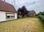 Vielseitiges Ein- oder Zweifamilienhaus in Bümmerstede mit Terrasse, Garage und attraktivem Grundstück - Garten.jpg